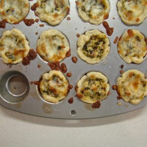 Caramelized Onion, Kale, and Artichoke Tartlets