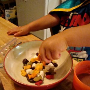 Going on a road trip? Set up a snack bar and let your kids put together snack bags for the trip.