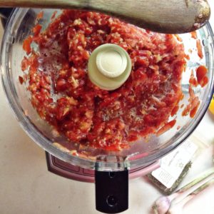 chopping tomatoes for salsa