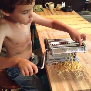 kids making pasta
