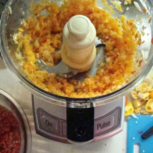 chopping onions and peppers for salsa