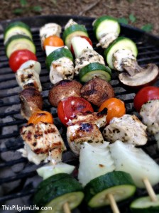 Copycat Zoe's Kitchen- An easy, at-home version of Zoe's grilled chicken kabobs, rice, and Greek salad.