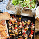 Kabobs are easy to assemble and perfect for summer nights and the fresh flavors of grilled Greek chicken! Add a variety of spring and summer veggies, and a couple of quick sides, and you have a delicious meal your family will love!