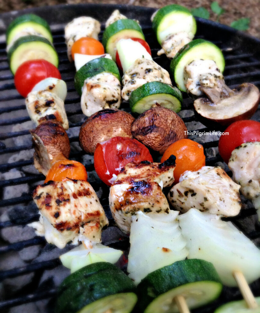 Grilled Greek chicken kabobs with summer vegetables