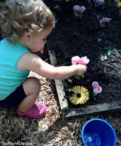 An awesome outdoor mud kitchen made with repurposed items from around the yard and house. Our new favorite backyard hangout!