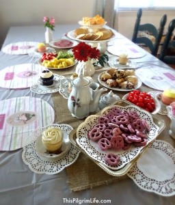 My little girl turned two this week and we celebrated with a very simple tea party. With items from the Dollar Store and Goodwill, I put together a pretty, yet inexpensive, party with a handful of her friends.