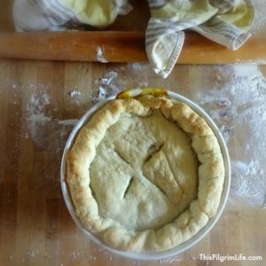 Homemade chicken pot pie, packed full of juicy chicken, bacon, eggs, and vegetables.