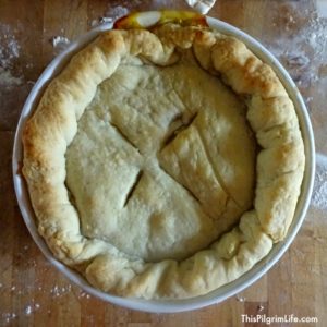 Homemade chicken pot pie, packed full of juicy chicken, bacon, eggs, and vegetables.