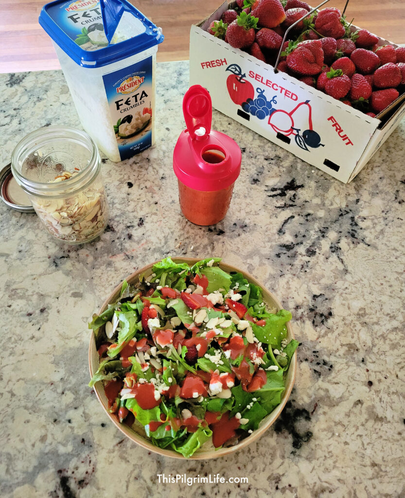 This strawberry balsamic vinaigrette is the PERFECT summer salad dressing! Even better if you make it with farm or garden fresh strawberries! 