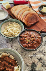 This rich, homemade ragu sauce is full of flavor, filling meat and veggies, and incredibly delicious served over pasta. This recipe is a great way to make jarred or homemade marinara sauces so much better!