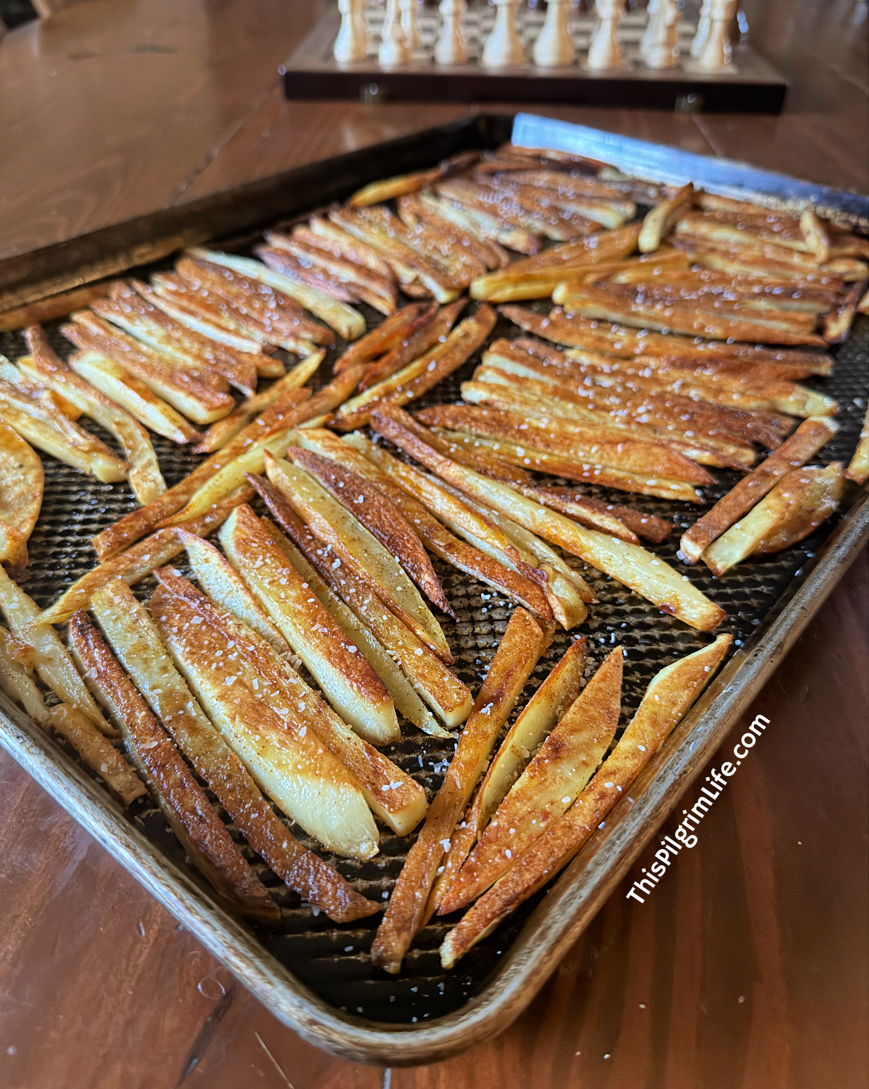 Perfectly crispy fries-- soft and tender on the inside and crisp and salty on the outside-- easy, minimal prep and oven roasted.